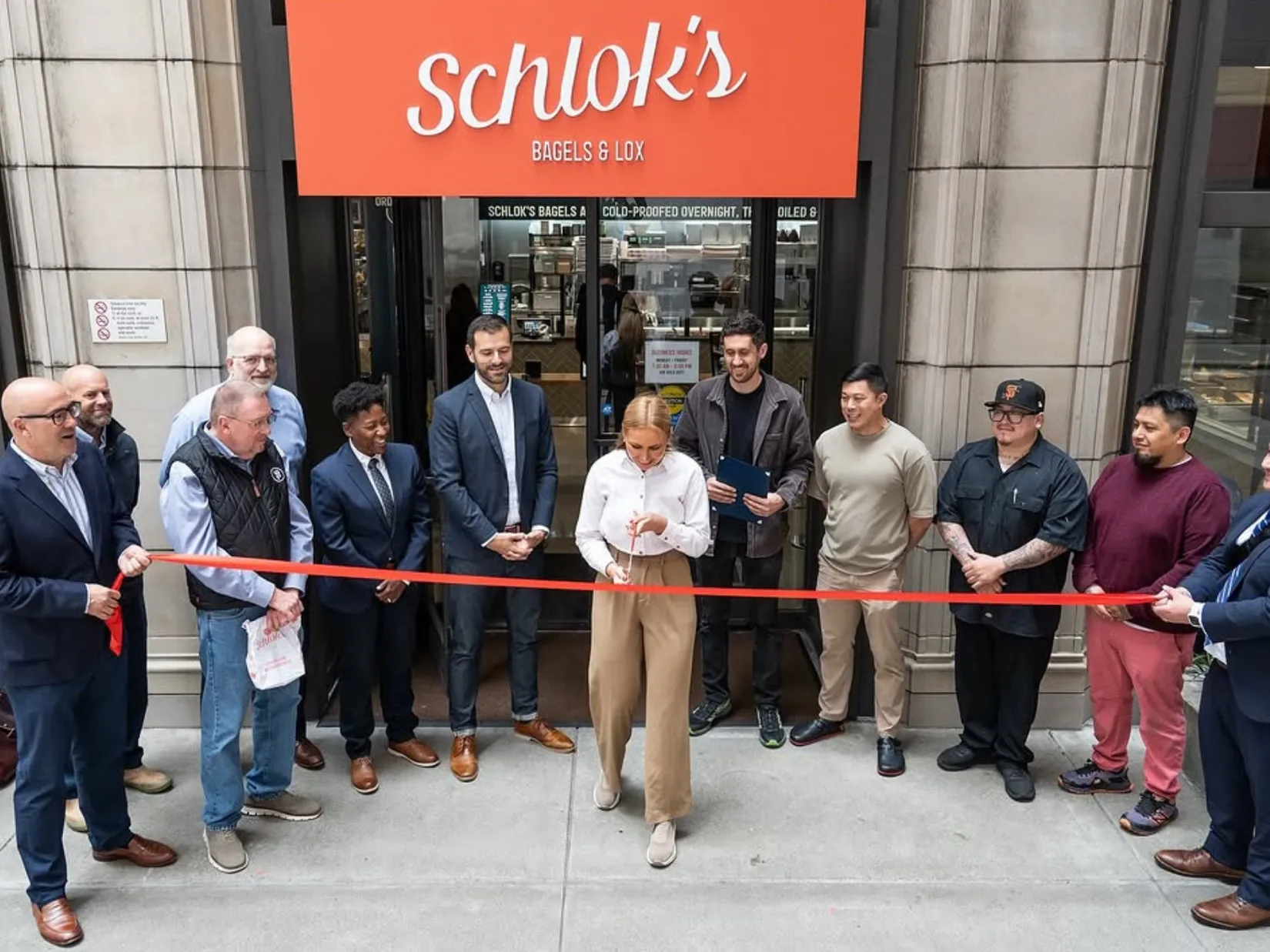 Schlock's Bagels in The East Cut — a real example of a storefront coming to life with a ribbon cutting